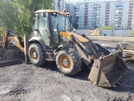 Услуги спецтехники для разравнивания грунта и насыпи